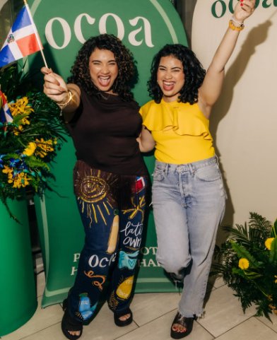 Two women celebrating at an Ocoa event